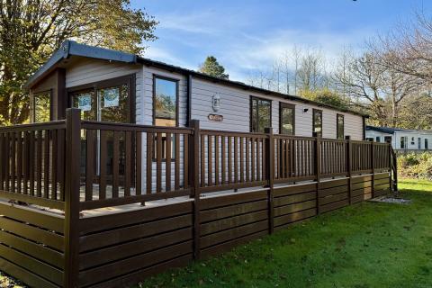 Outside View of a Caravan Holiday Home with a Decking area