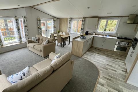 Lounge, Kitchen & Dining Area in a Luxury Lodge