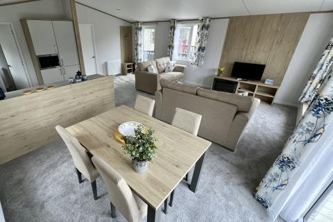 Lounge, Kitchen & Dining Area in a Luxury Lodge