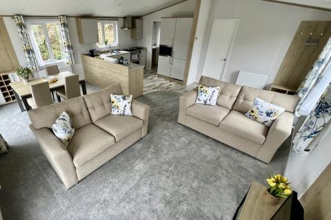 Lounge, Kitchen & Dining Area in a Luxury Lodge