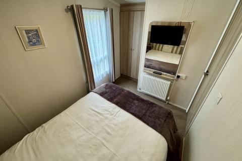 Interior of Master bedroom with double bed.