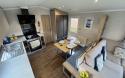 kitchen and dining room in the 2017 Swift Antibes