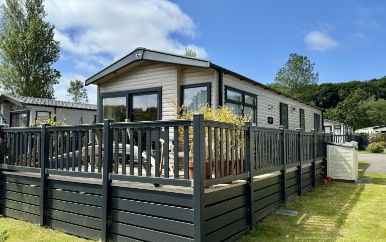 Outside view of a Caravan Holiday Home with a Decking area