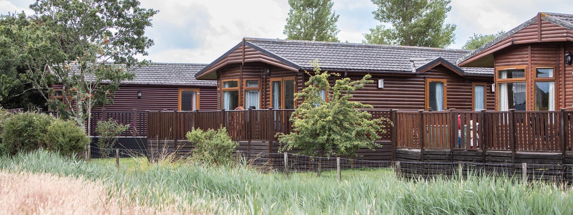 Luxury Wooden Lodges surrounded by Woodland