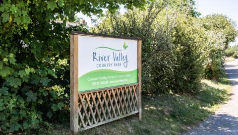 River Valley Welcome Sign surrounded by Hedging