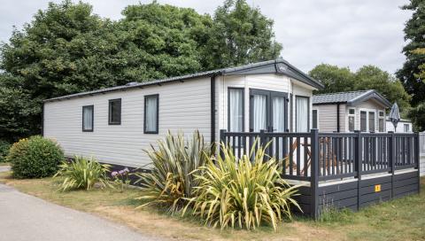 A Row of Caravan Holiday Homes with Decking areas