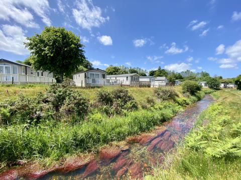Caravans on the banks of the River Hayle 