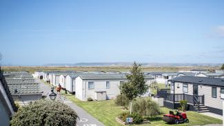SurfBay Holiday Park with Northam Burrows and the Sea in the Background
