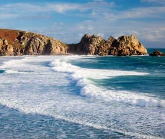 A Cornish Beach with Rugged Cliffs