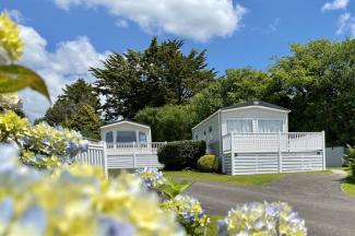 Holiday Homes Surrounded by Flowers & Trees