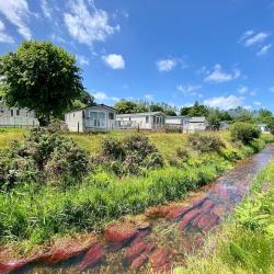 A River running alongside Caravan Holiday Homes