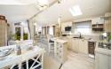 Lounge, Kitchen & Dining Area in a Luxury Lodge