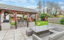 Outdoor View of a Cottages in Beautiful Gardens Featuring outdoor under cover BBQ area and Outdoor Seating