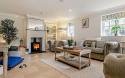Living area of a Holiday Home featuring a Log Burner