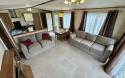 Interior picture of spacious lounge area with two freestanding sofas