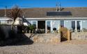 Outside View of a Holiday Home including Outdoor Dining area