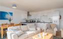 Lounge, Kitchen & Dining Area in a Luxury Lodge