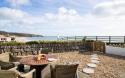 Outdoor Dining area which benefits from Beach & Sea views
