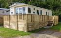 Exterior of caravan with wooden decking