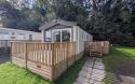 Exterior of caravan with wooden decking
